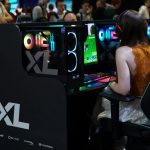 XL Yoyotech gaming PCs in action, crowd in background, at Insomnia 68 showXL Yoyotech gaming PCs in action, crowd in background, at Insomnia 68 show
